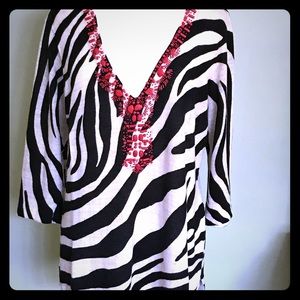 Animal Print Knit with Orange Stone Detail.